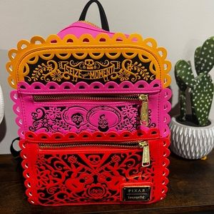 Loungefly Coco Papel Picado mini backpack.